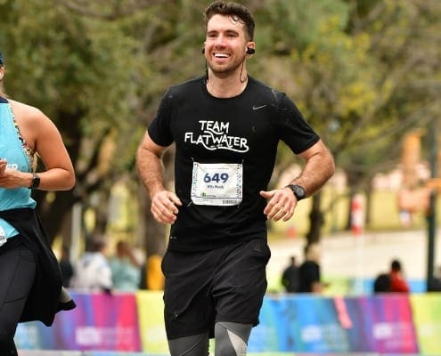 Smiling runner in Team Flatwater shirt Smiling runner in Team Flatwater shirt