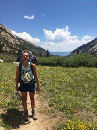 Image of Blair Nagel backpacking through Colorado. Learn how running became her new routine when you ready her edition of My Running Story.