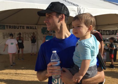 Jeremy Tavares poses with his kid. His ultimate running goal will culminate with the 2020 Austin Marathon.