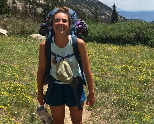 Image of Blair Nagel backpacking through Colorado. Learn how running became her new routine when you ready her edition of My Running Story.