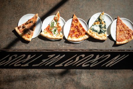 Picture of different pizza slices from Home Slice Pizza, one of our favorite south Austin lunch spots along the Austin Marathon course.