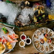 Fresh shrimp and oysters at Perla's. They're one of the Austin Marathon's five recommended south Austin restaurants. Credit: Perla's Facebook page.