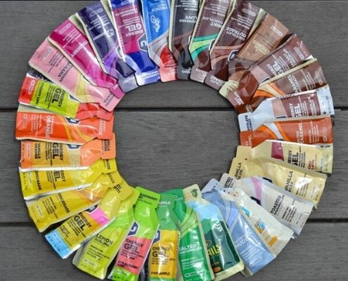 Image of a circle of GU Energy Gels arranged by flavor and color of packet. GU Energy Labs is the Official Energy Gel and Chew of the 2020 Ascension Seton Austin Marathon.