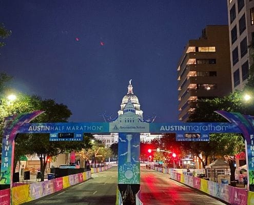 Image of the 2020 Ascension Seton Austin Marathon finish line with the Texas State Capitol in the background. Read this blog to learn how successful 2020 race weekend was!