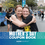 Image of a mother and daughter hugging at the 2020 Austin Half Marathon finish line. Enjoy this blog and download the free Mother's Day coupon book!