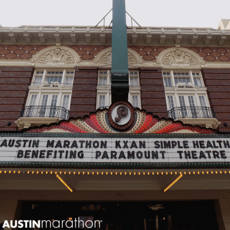 Image of the Paramount Theatre marquee displaying the name Austin Marathon KXAN SimpleHealth 5K benefitting Paramount Theatre.