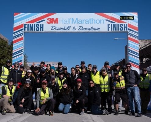 Image of the High Five Events crew after the 2020 3M Half Marathon. Read this blog to meet High Five Events.