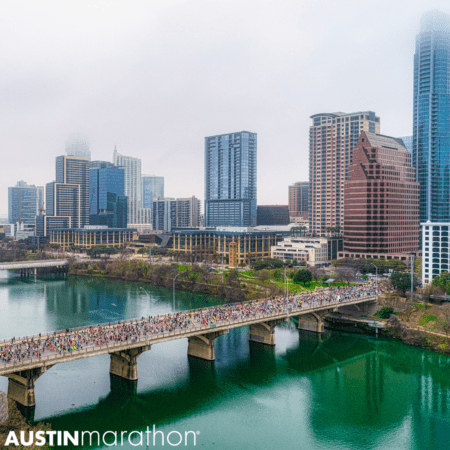 Image of the Austin skyline as runners cross the Congress Avenue Bridge during the 2020 Ascension Seton Austin Marathon. Registration for the 30th annual Austin Marathon opens on June 1st.