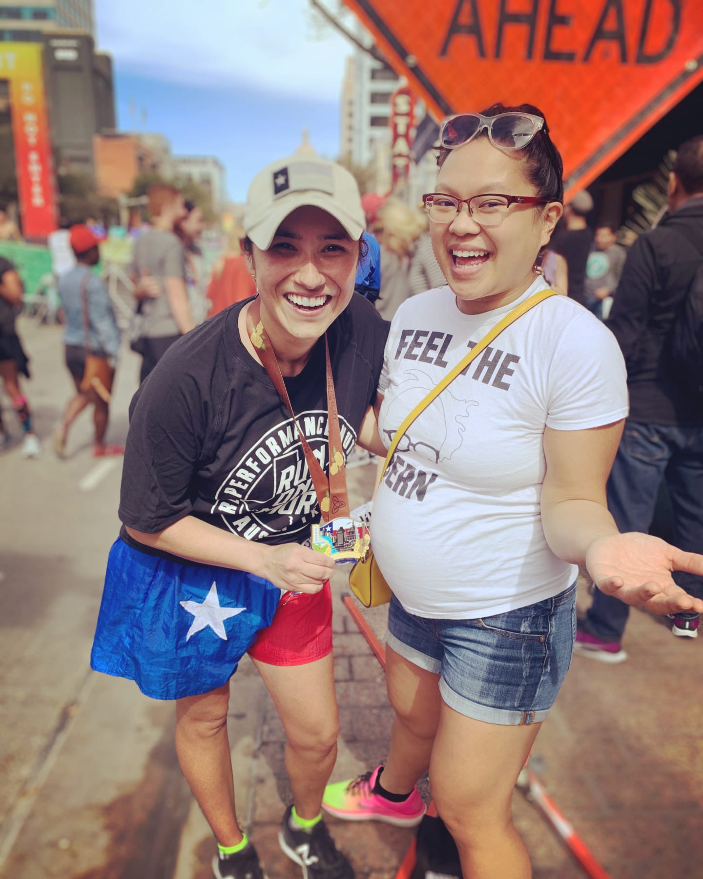 Image of Eileen Alvarez and her friend after the 2020 Ascension Seton Austin Marathon. Her story of finishing the Austin Marathon includes overcoming adversity before she got to the start line.