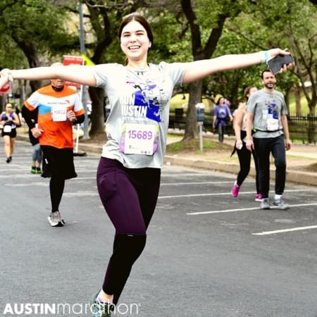 Women Runner with Arms Outstretched Official Photo Austin Marathon by Finisher Pix