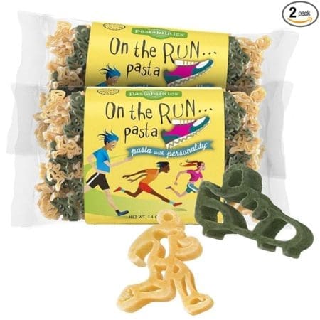 Two packs of "On the Run" pasta by Pastabilities, featuring pasta shapes of runners in multiple colors. The packaging has a cartoon image of runners and a stylized runner's face. The label reads "Pasta with personality," and there is a "2 pack" indicator in the corner—perfect for any running gifts or Father’s Day gift guide. Austin Marathon Half Marathon & 5K