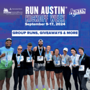 Group of runners, filled with excitement, pose with medals and bibs after a race, standing in front of a promotional banner for the "2025 Austin Marathon Launch Week" from September 9-17. The banner highlights upcoming events like group runs, giveaways, special offers, and more. Austin Marathon Half Marathon & 5K