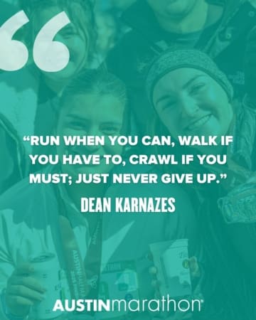 Two smiling marathon participants wearing medals and winter hats, holding drinks. Overlaid text reads this running inspiration: “Run when you can, walk if you have to, crawl if you must; just never give up.” – Dean Karnazes. Austin Marathon logo at bottom. Austin Marathon Half Marathon & 5K