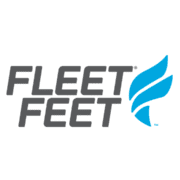 The Fleet Feet logo, featuring "FLEET FEET" in bold gray letters beside a blue, stylized wing design on a white background, represents one of our valued sponsors. Austin Marathon Half Marathon & 5K