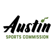 Logo for the Austin Sports Commission. The word "Austin" is written in black script with a green musical note above the "i," and "SPORTS COMMISSION" is printed in green capital letters below, celebrating its sponsors and supporters. Austin Marathon Half Marathon & 5K
