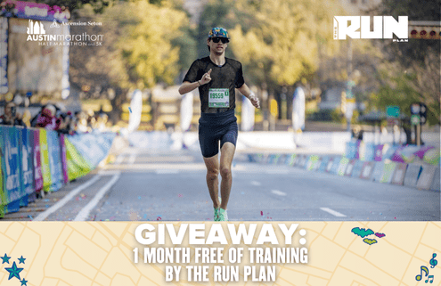 A runner in sunglasses and a cap crosses the marathon finish line. Text at the bottom reads: “GIVEAWAY: 1 MONTH OF FREE TRAINING BY THE RUN PLAN.” Marathon branding appears in the background. Austin Marathon Half Marathon & 5K
