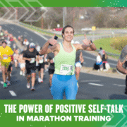 A smiling marathon runner in blue shorts gives two thumbs up while running among a large group. Text reads: "The Power of Positive Self-Talk in Marathon Training—boost your mindset for marathon success. Austin Marathon Half Marathon & 5K