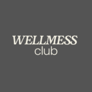 Text logo on a dark gray background reads "WELLMESS club" in bold, light-colored letters, with "WELLMESS" above "club," perfect for those seeking free group runs and connecting with Austin running groups. Austin Marathon Half Marathon & 5K