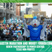 A person in a gray bat mascot costume stands with arms raised among Austin Marathon runners at a city event. Text highlights a partnership with Moody Foundation to benefit Central Texas Non-Profits. Austin Marathon Half Marathon & 5K