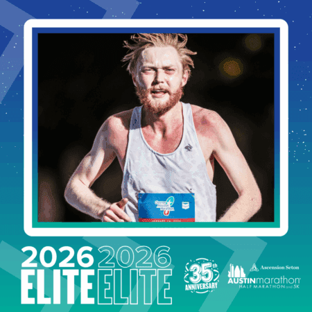 A male runner with a red beard and light hair, wearing a white tank top and bib, runs outdoors in sunlight. The border reads 