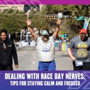 Three smiling runners cross a race finish line together under sunny skies; the person in the center raises both arms in triumph. Below, text reads: "Dealing With Race Day Nerves: Essential race day tips to stay calm and focused. Austin Marathon Half Marathon & 5K