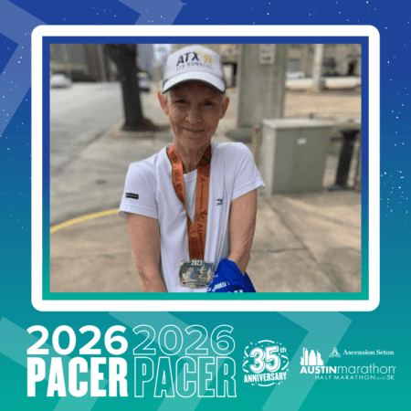 An older woman in a white running cap and shirt smiles at the camera, proudly displaying her Austin Marathon finisher medal. The graphic reads “2026 PACER,” “Pacer Group,” “35th Anniversary,” and “Austin Marathon Half Marathon and 5K.”. Austin Marathon Half Marathon & 5K