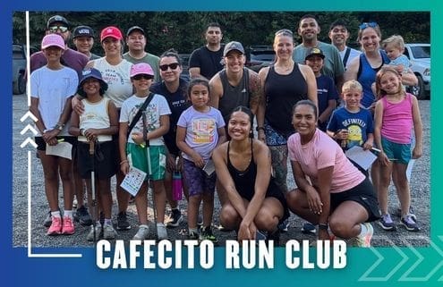 A diverse group of adults and children, smiling and dressed in athletic wear, pose together outdoors for a group photo after a Buda Running Club Group Run. Text at the bottom reads, "CAFECITO RUN CLUB. Austin Marathon Half Marathon & 5K