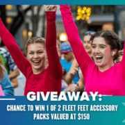 Two women in bright pink shirts cheer with arms raised among a crowd at an outdoor event. Text reads: "GIVEAWAY: Chance to win 1 of 2 Fleet Feet accessory packs valued at $150—enter now using the template provided!. Austin Marathon Half Marathon & 5K