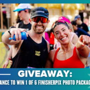 A smiling man and woman in athletic gear pose for a race photo, both pointing towards the camera. Text reads: "GIVEAWAY: Enter to win 1 of 6 FinisherPix Photo Packages. Austin Marathon Half Marathon & 5K