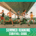 Five people run under a bridge on a gravel path in bright athletic wear. Greenery and a city skyline are visible in the background. Text at the bottom reads, “SUMMER RUNNING SURVIVAL GUIDE” with summer running tips. Austin Marathon Half Marathon & 5K