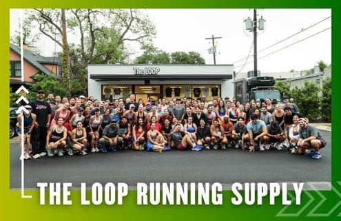 A large group of people, part of a local Running Club, poses in front of The Loop Running Supply store on a street, smiling at the camera. The image has a green and yellow gradient border and text that reads “THE LOOP RUNNING SUPPLY.”. Austin Marathon Half Marathon & 5K