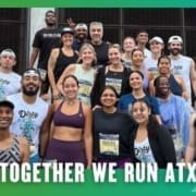 A diverse group of runners from the Buda Running Club pose together and smile for a photo after a race. Most wear race bibs and athletic gear. Text below reads, "TOGETHER WE RUN ATX," with a green gradient border in the background. Austin Marathon Half Marathon & 5K